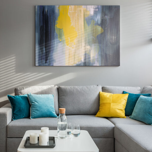 Living room with corner sofa, colorful cushions and white coffee table